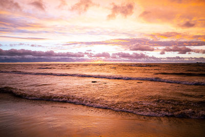 Reddish-yellow sunset by the baltic sea on an autumn day