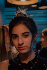 Close-up portrait of a smiling young woman