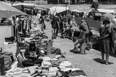 Group of people at market stall