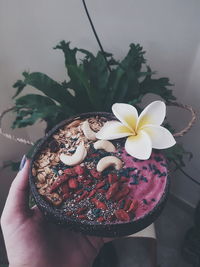 High angle view of hand holding ice cream