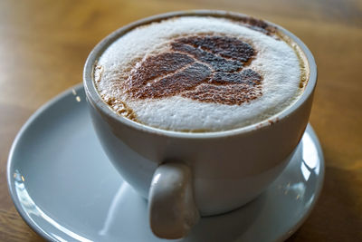 High angle view of cappuccino on table