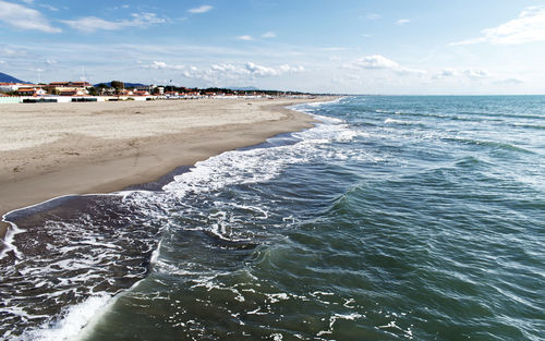 Scenic view of beach against sky