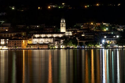 Illuminated buildings in city at night