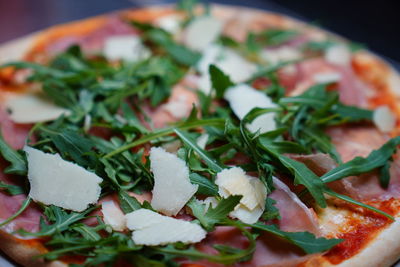 Close-up of pizza served in plate