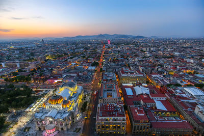 High angle view of city buildings at dusk