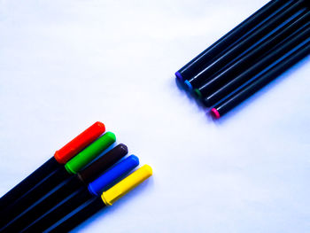 Close-up of multi colored pencils on table