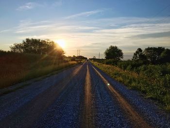 View of empty road at sunset