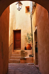 Narrow alley amidst buildings in town