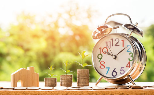 Close-up of clock on table