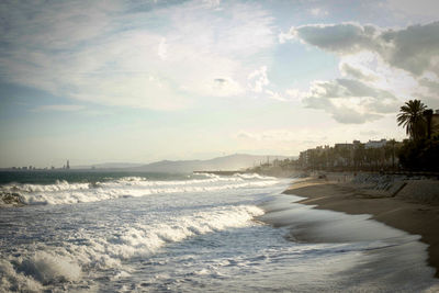 Scenic view of beach against sky