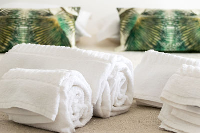 Close up of white towels on table