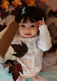 High angle portrait of cute girl at home