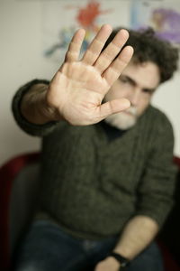 Front view of man gesturing