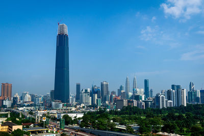 Modern buildings in city against sky