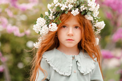 Portrait of girl wearing wreath