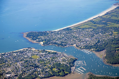 High angle view of city by sea