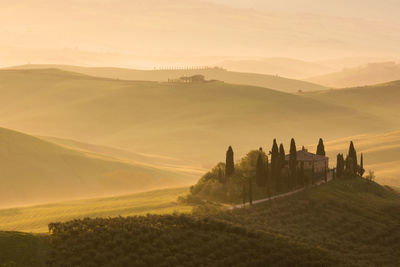 Scenic view of landscape against sky during sunset