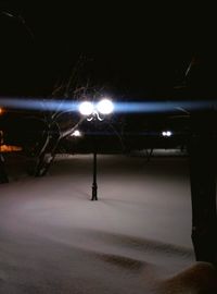 View of illuminated street light at night