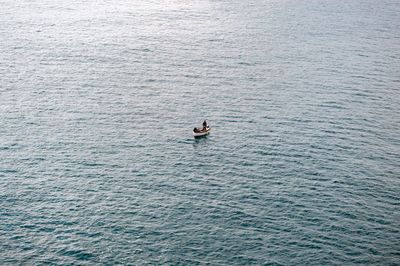 High angle view of people on boat in mediterranean sea in naples, italy