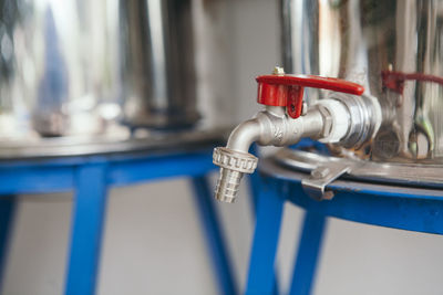 Close-up of spout on water tank