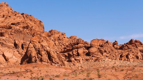 Rock formations against blue sky