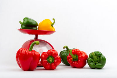 Close-up of bell peppers against white background