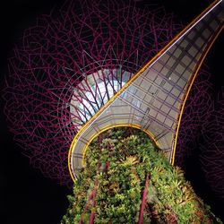 Low angle view of illuminated ferris wheel