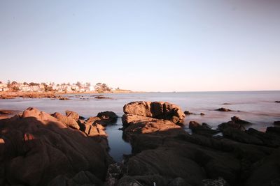 Scenic view of sea against clear sky