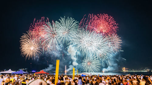 Firework display at night