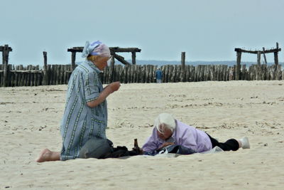 Men on beach