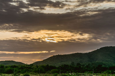 Scenic view of landscape against sky during sunset