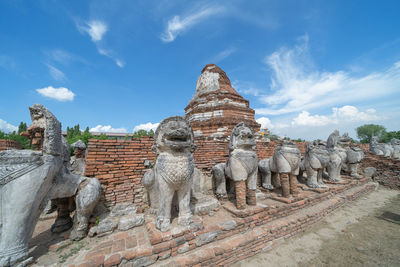 Statue of historic building against sky