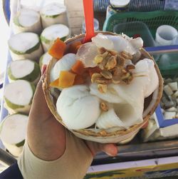 Close-up of hand holding ice cream