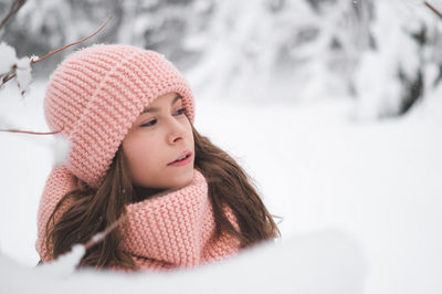 Portrait of cute girl in snow