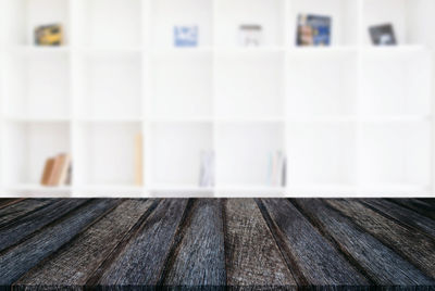 Close-up of blinds on table at home