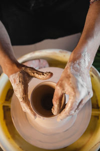 Cropped image of man working at workshop