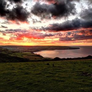 Scenic view of sea against cloudy sky