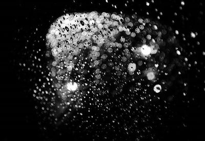 Close-up of water drops on glass