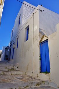 Low angle view of building against blue sky