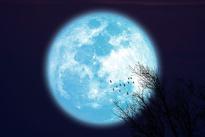 Low angle view of moon in sky