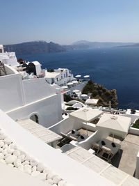 High angle view of townscape by sea