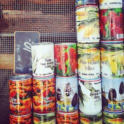 Colorful containers for sale in shop