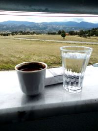Glass of coffee on table