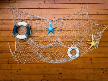 Decorations hanging on wooden wall