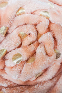 Soft pink plaid. home textiles for comfort. soft fluffy fabric texture.