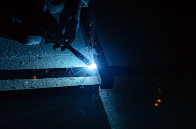 Low section of man working at night