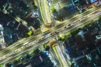 High angle view of light trails on road in city