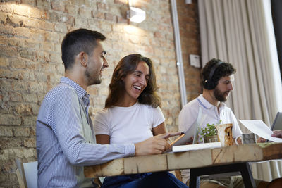 Business colleagues working at office