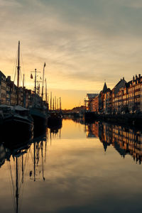 Boats moored at harbor