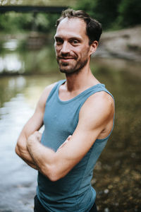 Portrait of young man standing outdoors